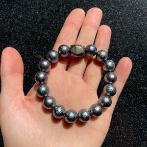 Pyrite metallic beaded bracelet for women with a large silver bead.
